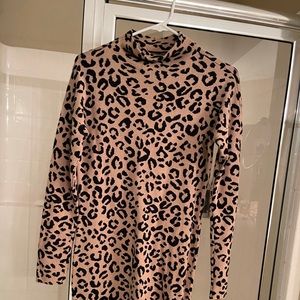 Brand new Nicole Miller sweater dress in a size small.